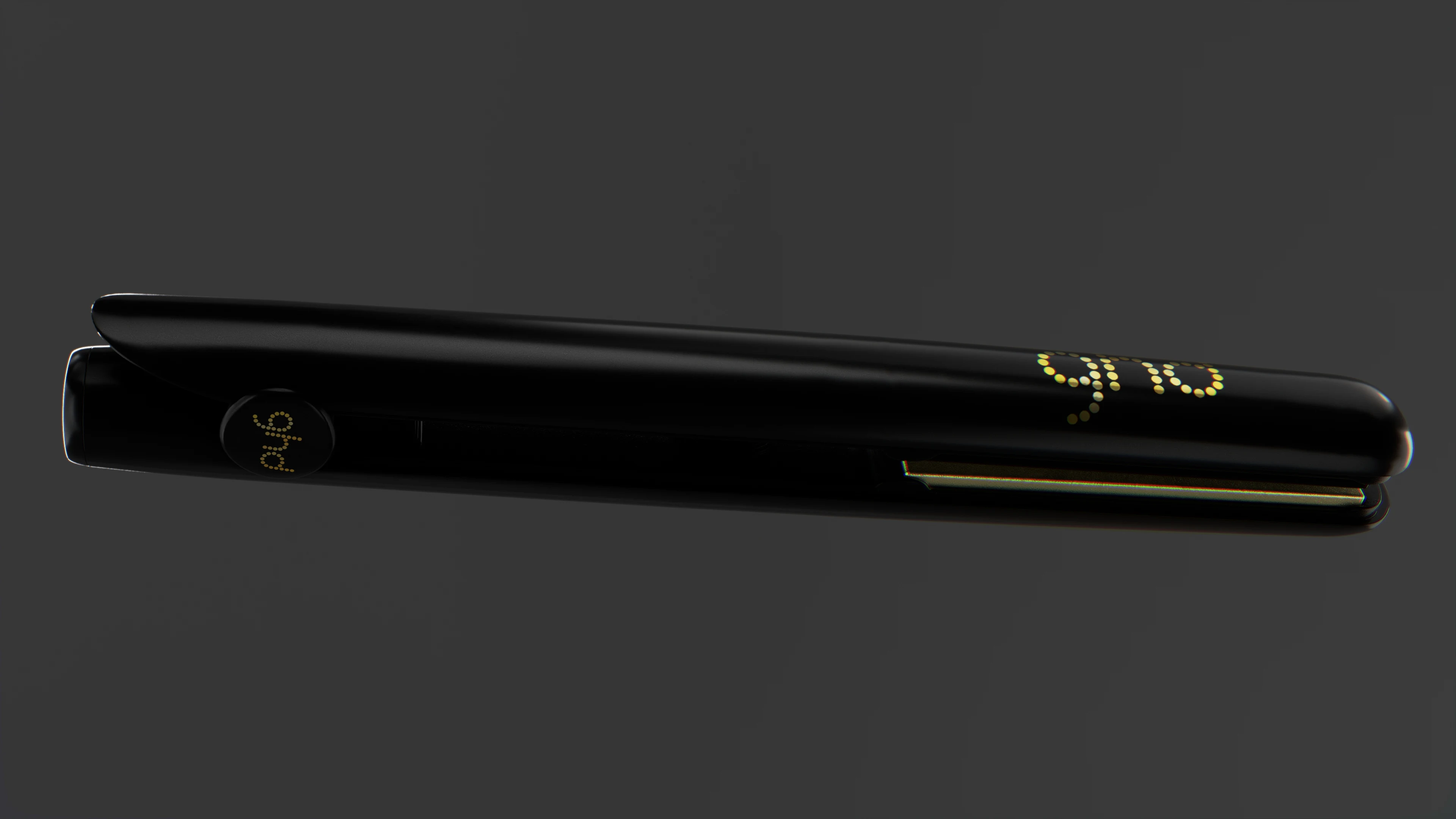 Black and gold ghd Gold hair straightener shown closed in a 3D product render.